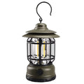 Portable camping head lantern in dark green colour showing compact 16.6cm height dimensions