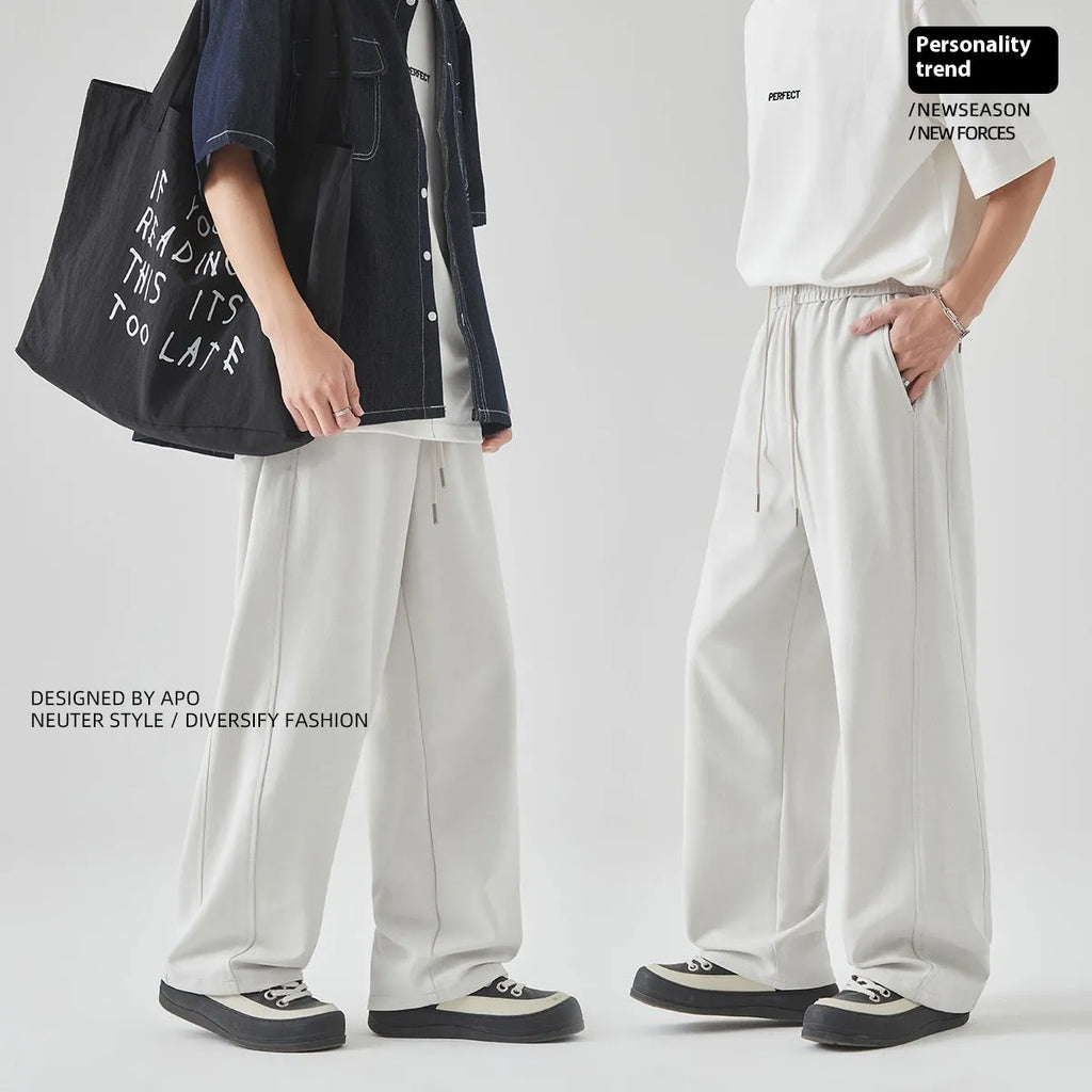 Men's casual straight-leg trousers in grey with a lace-up front and high waist design.
