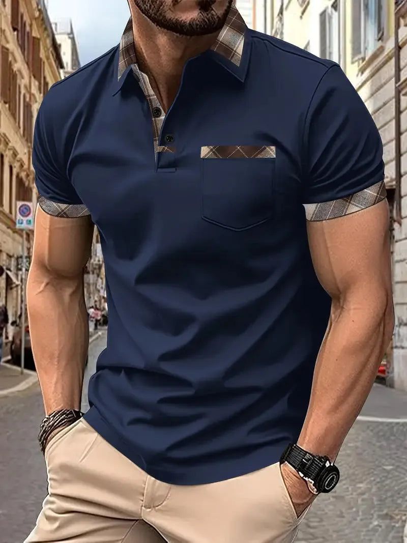 Man wearing a loose-fit plaid colourblock short sleeve t-shirt in a summer setting.