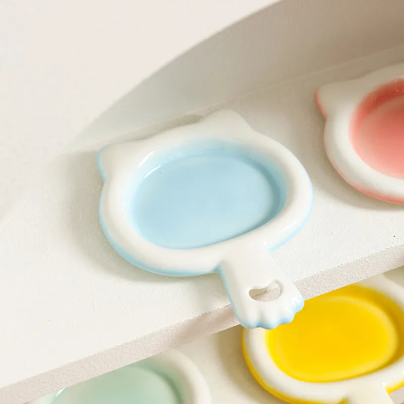 Ceramic cat bowl with shallow design in selected colour showing curved edges for spillage reduction