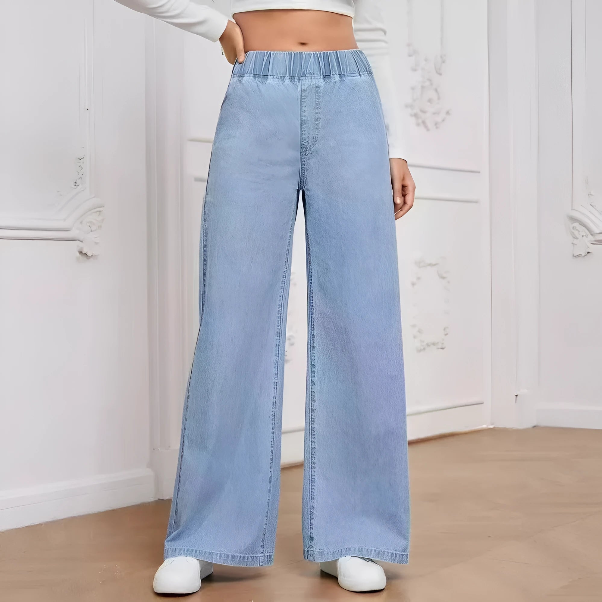 Light blue washed wide-leg denim trousers with straight cut and mid waist design