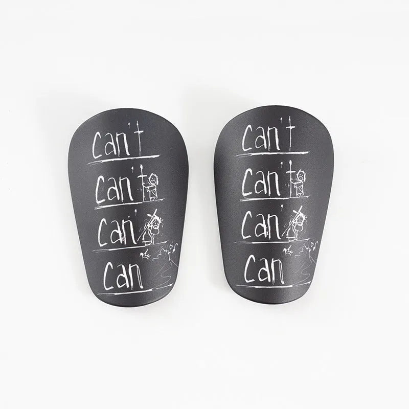 Pair of football shin guards for S and XS size in black, blue, white, or white-black colour.