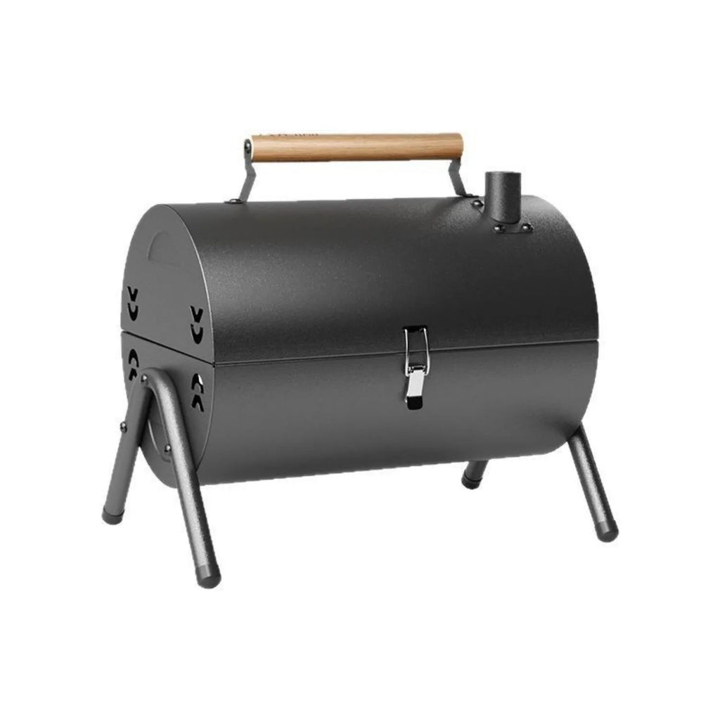 White round chimney oven style portable folding grill for frying and baking outdoors.