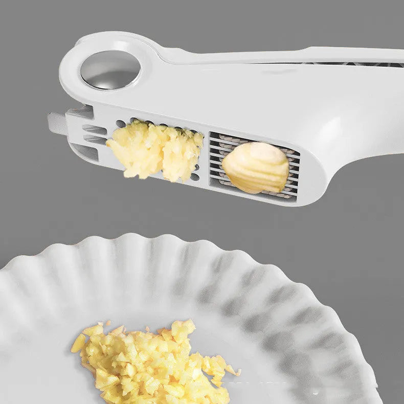 Manual garlic press in white, green, or orange with ABS and stainless steel construction