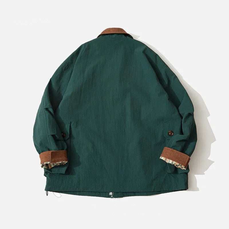 Green casual jacket with side seam pockets on a hanger, showing regular fit and long sleeves.