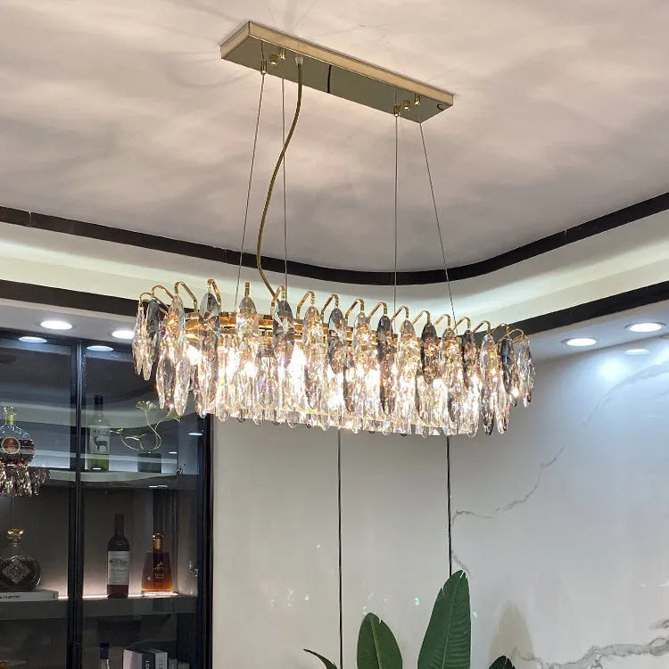Crystal chandelier with iron body, LED light source, 220V, multi-head ceiling light in circular or elliptical size options.