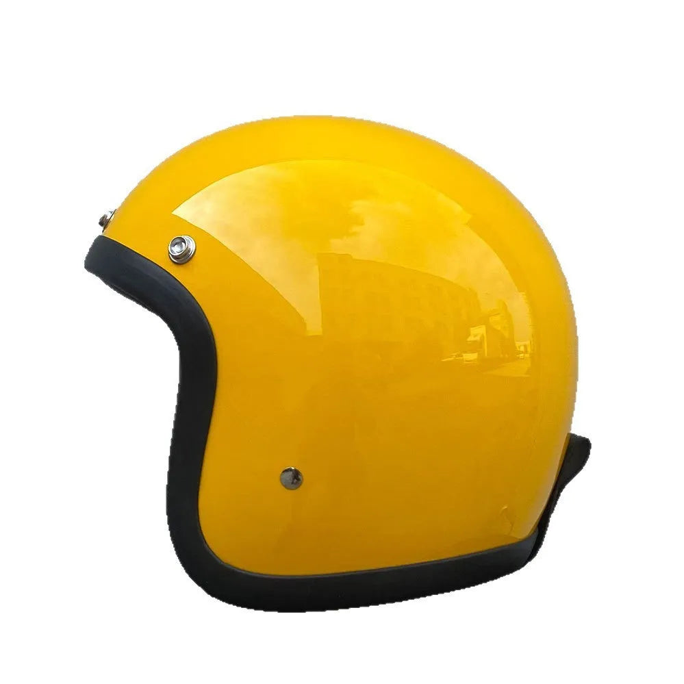 A retro-styled half motorcycle helmet made from glass fibre, shown in a matte black flower colour finish.