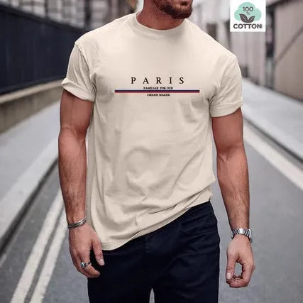 Man wearing a loose-fitting short-sleeved pure cotton t-shirt with a printed design in apricot colour.