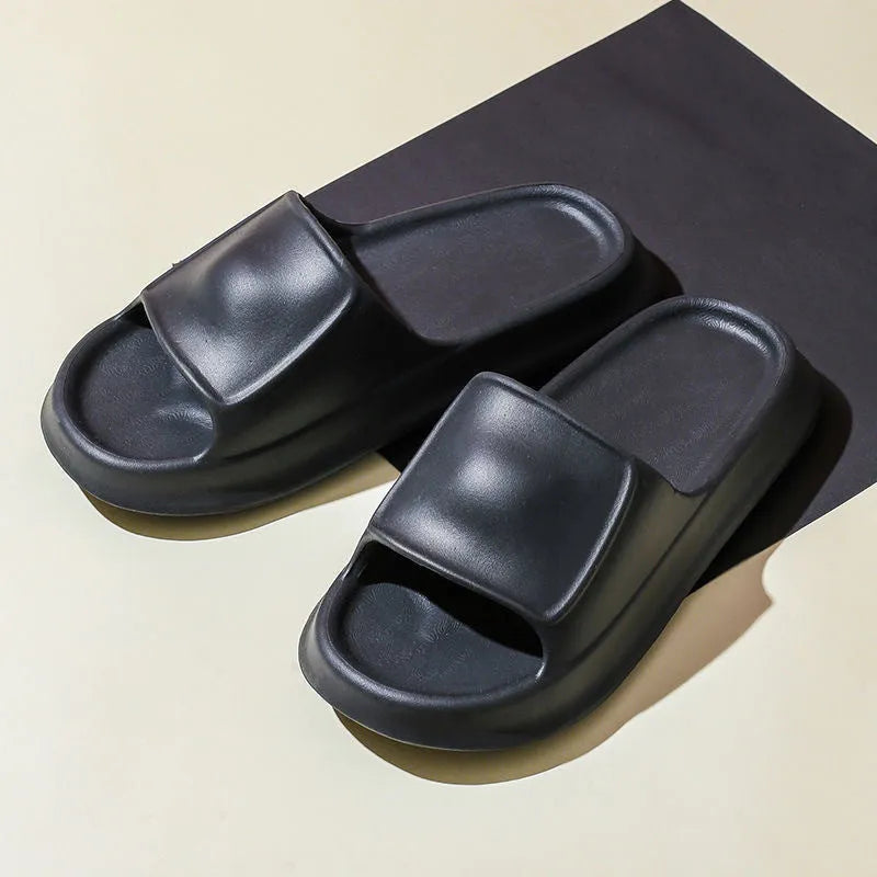 Soft EVA flip-flop slippers in multiple colours on a white background, showing thick sole and non-slip pattern.
