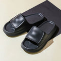 Soft EVA flip-flop slippers in multiple colours on a white background, showing thick sole and non-slip pattern.