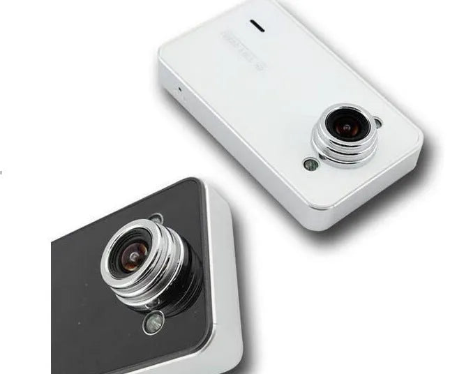 K6000 car dash cam with 120 degree wide angle lens mounted on front windshield in black finish