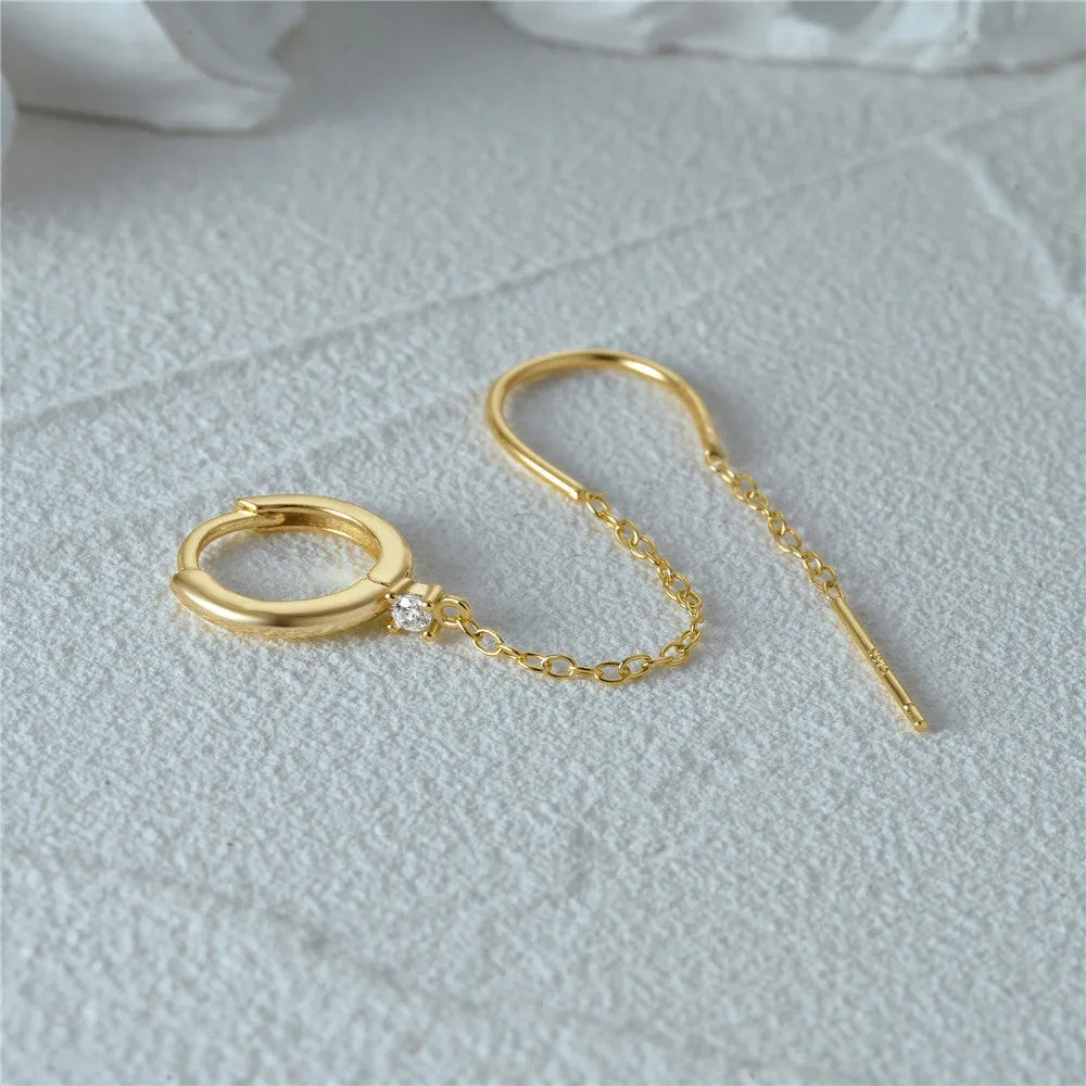 S925 sterling silver geometric earring with flower, tassel and chain detail in gold electroplated finish.