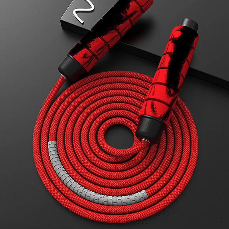 Red and grey polyester skipping rope, 2.8 metres long, with 16cm handles and 4cm diameter