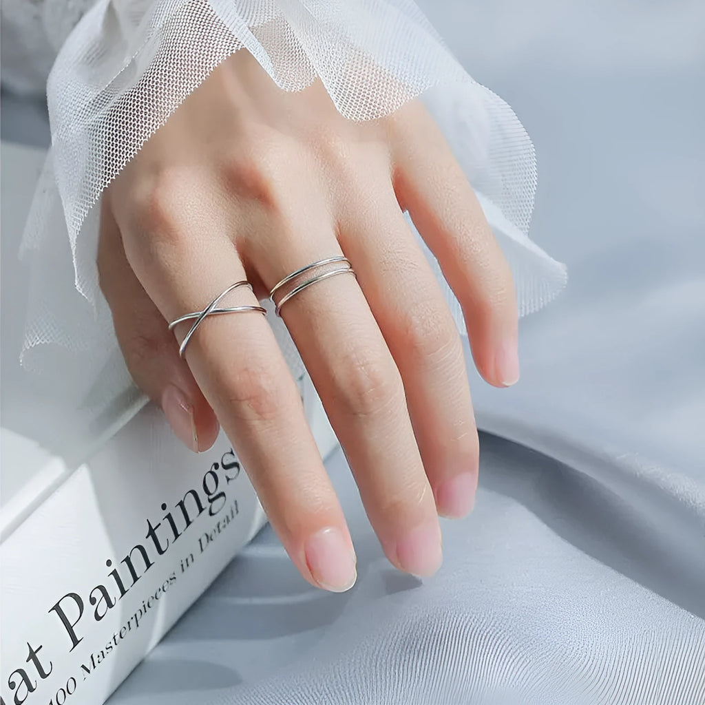 Silver plated geometric cross ring for women with adjustable opening in colour 23 and 24 options