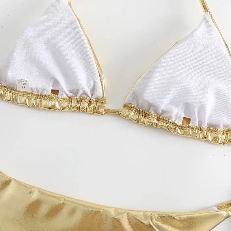 Women's lace-up bikini swimsuit in metallic gold colour with adjustable ties