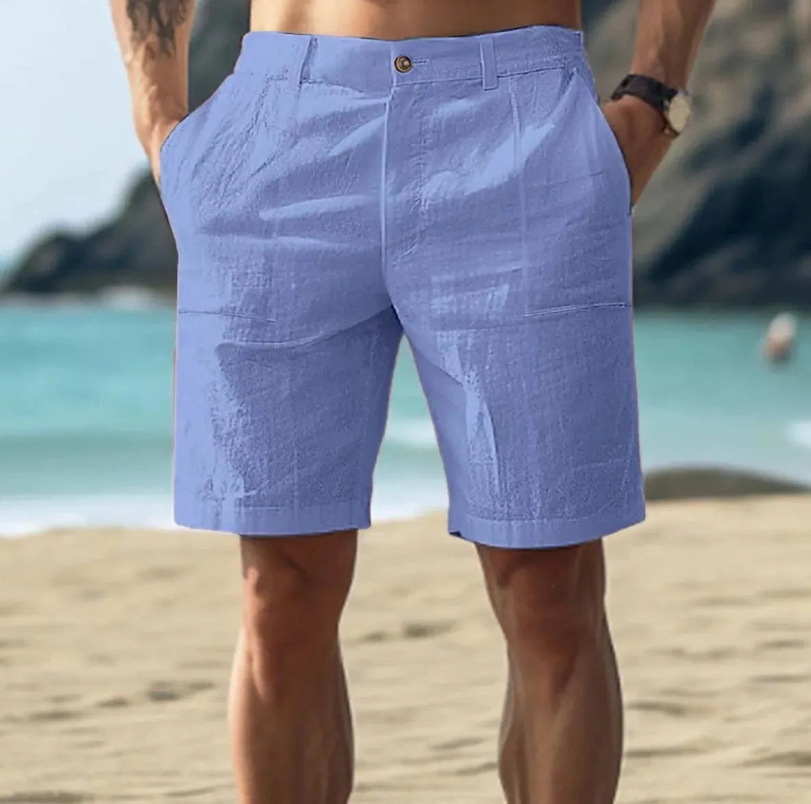 Man wearing dark blue cotton linen blend five-point length casual shorts with a button fly.