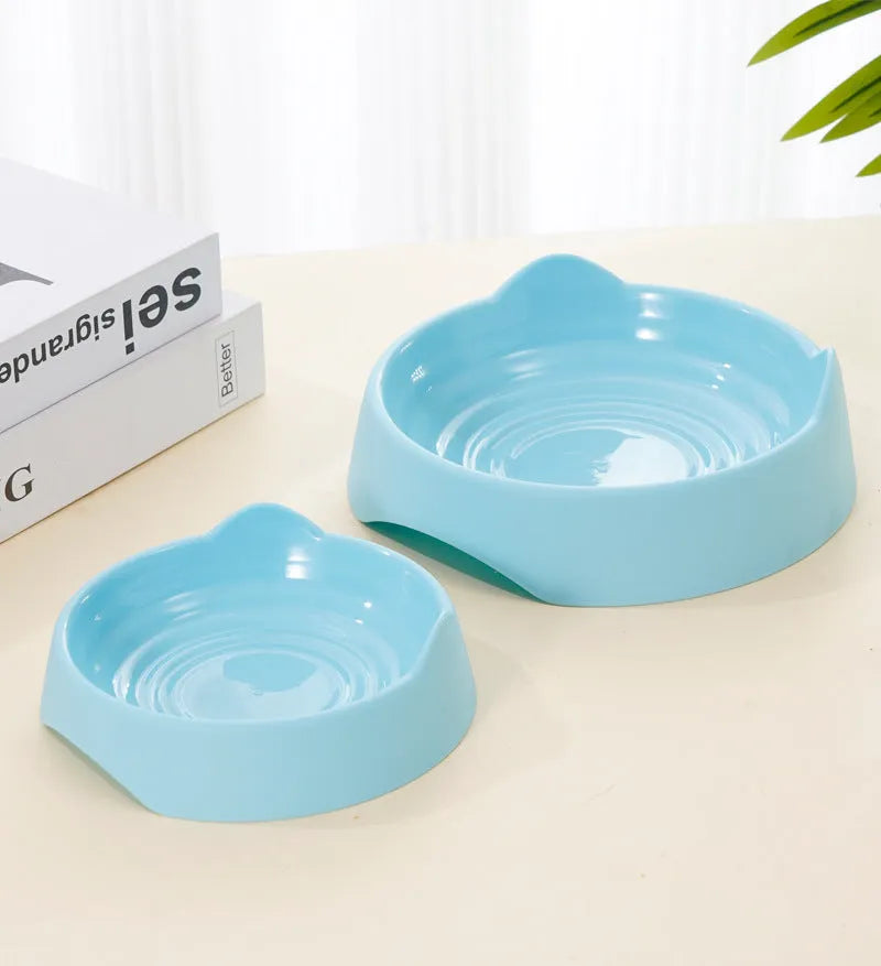 Ceramic slow feeder dog bowl with puzzle maze design in blue, green, or pink colour for fast-eating dogs