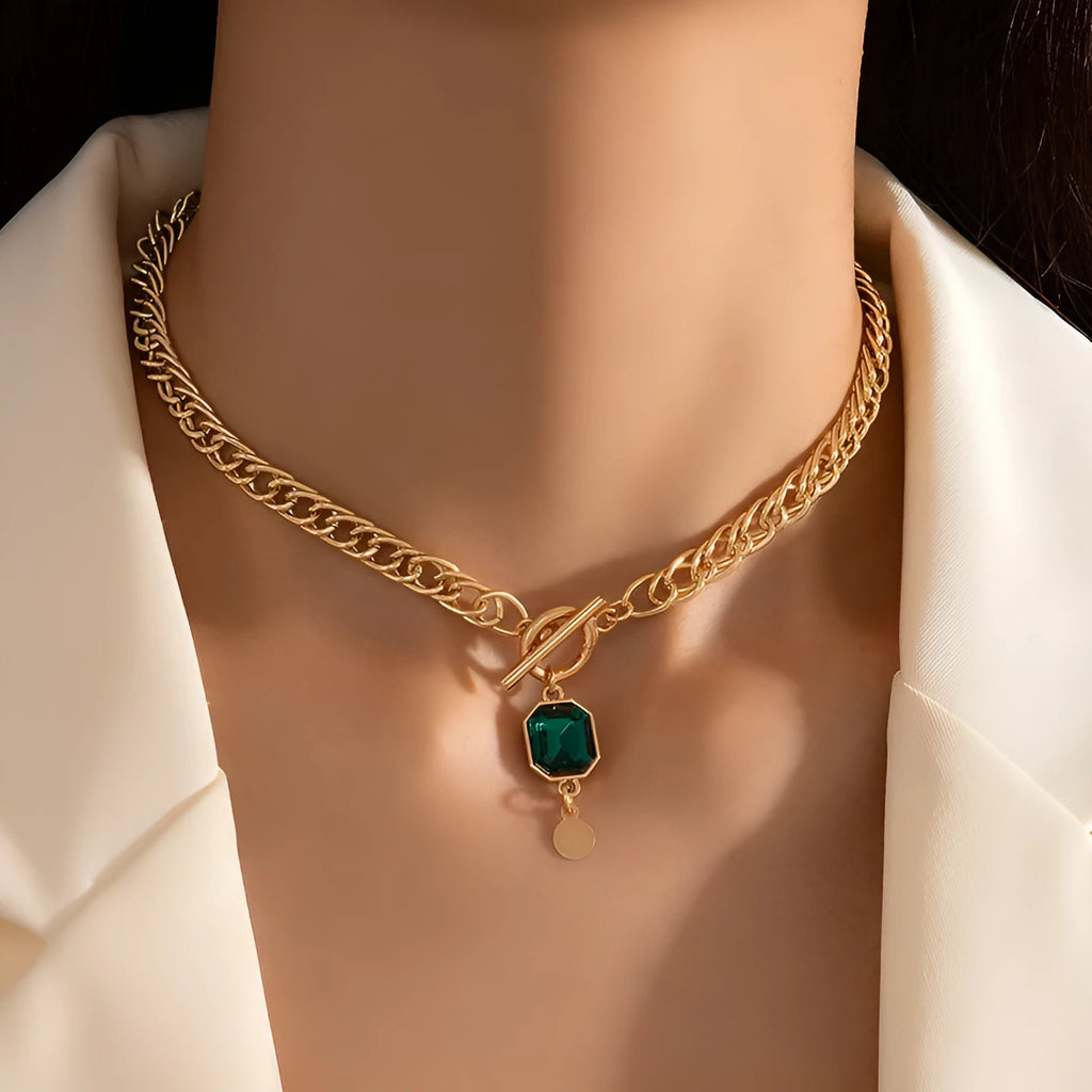 Gold electroplated titanium steel French retro pendant necklace with geometric design and emerald zircon stones
