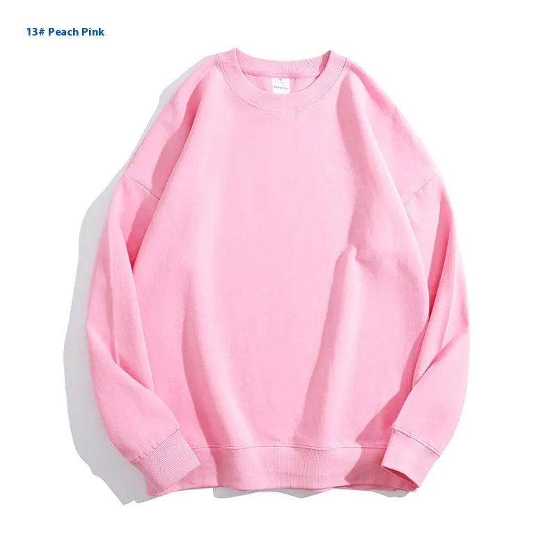 Cotton off shoulder pullover sweater in a solid colour with round neck and long sleeves.