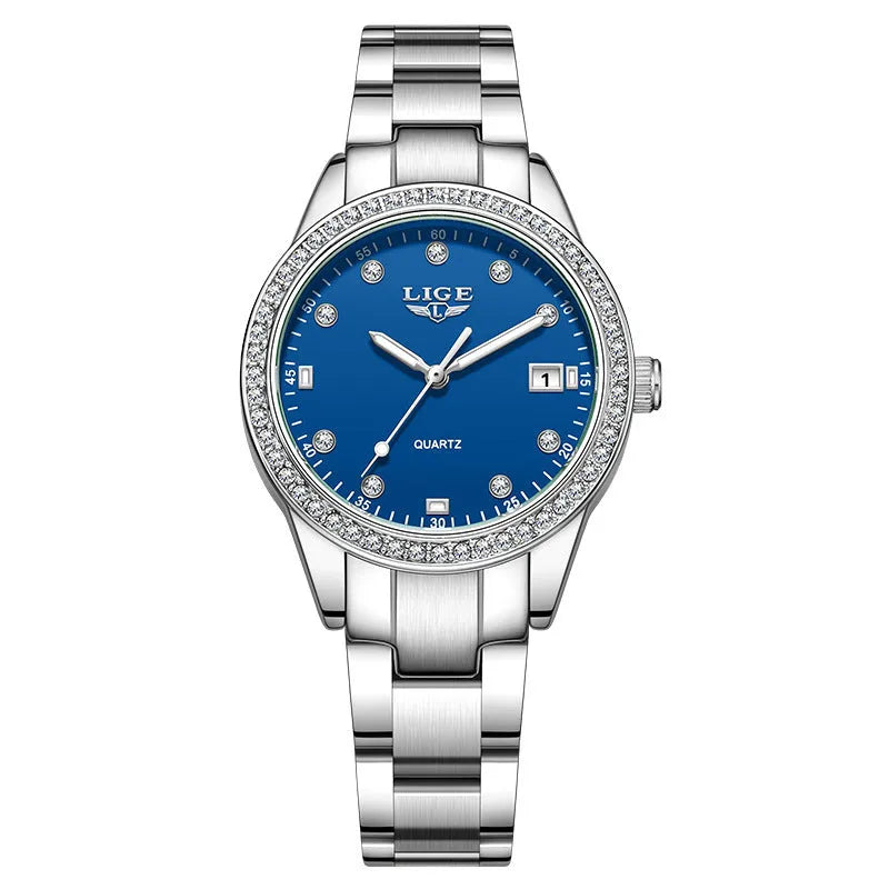 Women's silver stainless steel watch with diamond bezel and luminous hands on a 34mm round dial.