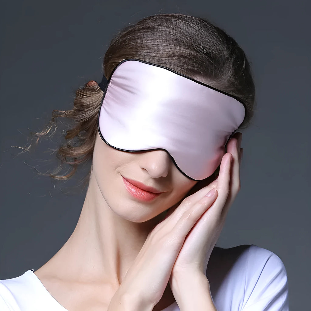 Double-sided mulberry silk eye mask with embroidery, shown in champagne colour, dimensions 22cm by 11cm.