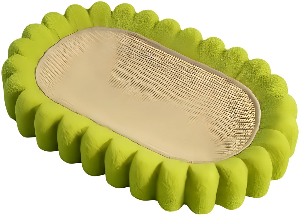Green oval sisal cat scratch pad bowl serving as a cat bed and scratcher.