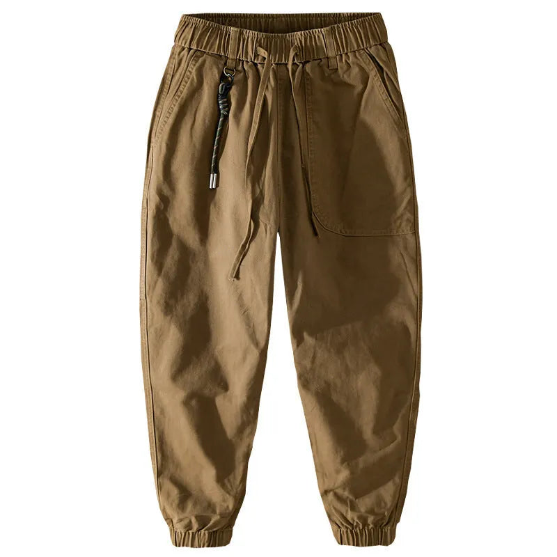 Men's army green cotton overalls with drawstring waist and ankle-band legs on a plain background.