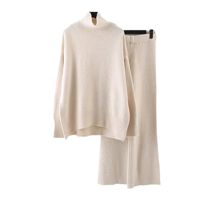 Women's beige acrylic sweater and wide-leg trousers casual two-piece set on a hanger.