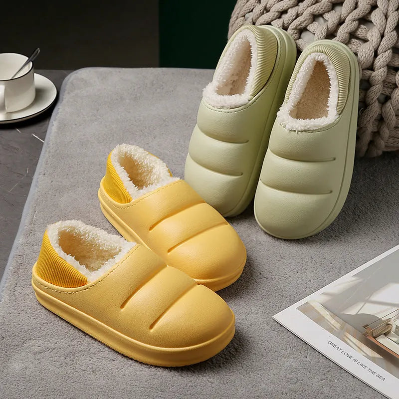 A pair of waterproof EVA garden slippers with a plush lining, shown in a solid colour with a non-slip sole.