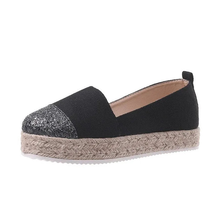 Black and Milky White plus-size canvas oversleeve shoe covers showing round toe design.