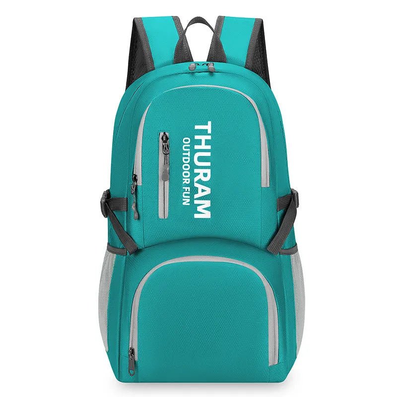 Large dark blue outdoor backpack with an air pillow belt, shown folded and unfolded.