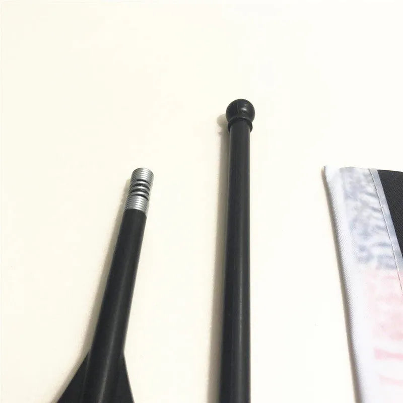 A square polyester flag on a plastic pole designed for bicycle handlebar mounting.