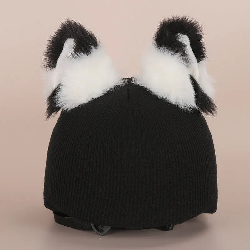 Soft plush cartoon character cover on a motorcycle helmet, showing size M and decorative ear sections.