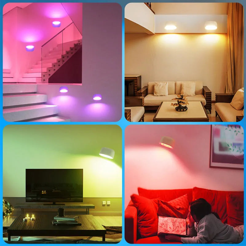 Modern white plastic magnetic wall lamp with a remote control on a wooden surface.