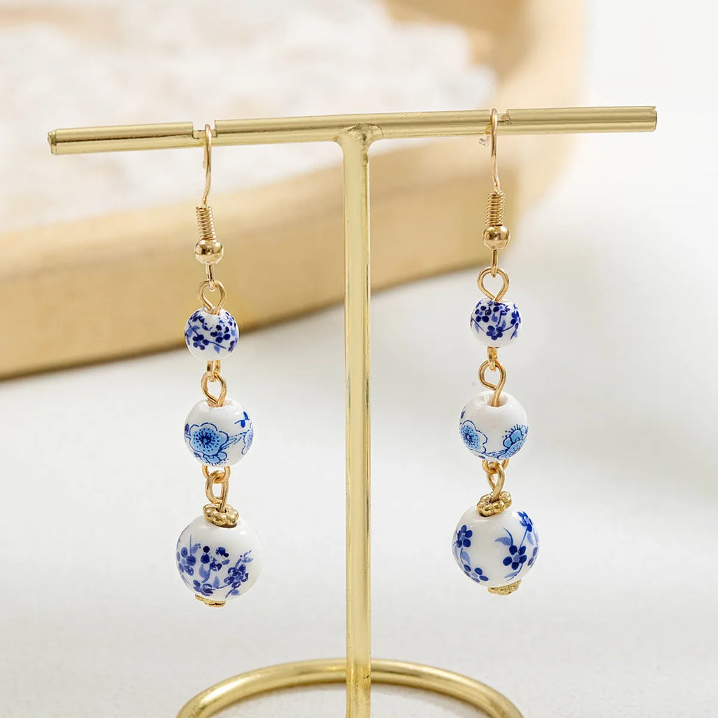 Blue and white porcelain ceramic bead long retro earrings with alloy construction and geometric design