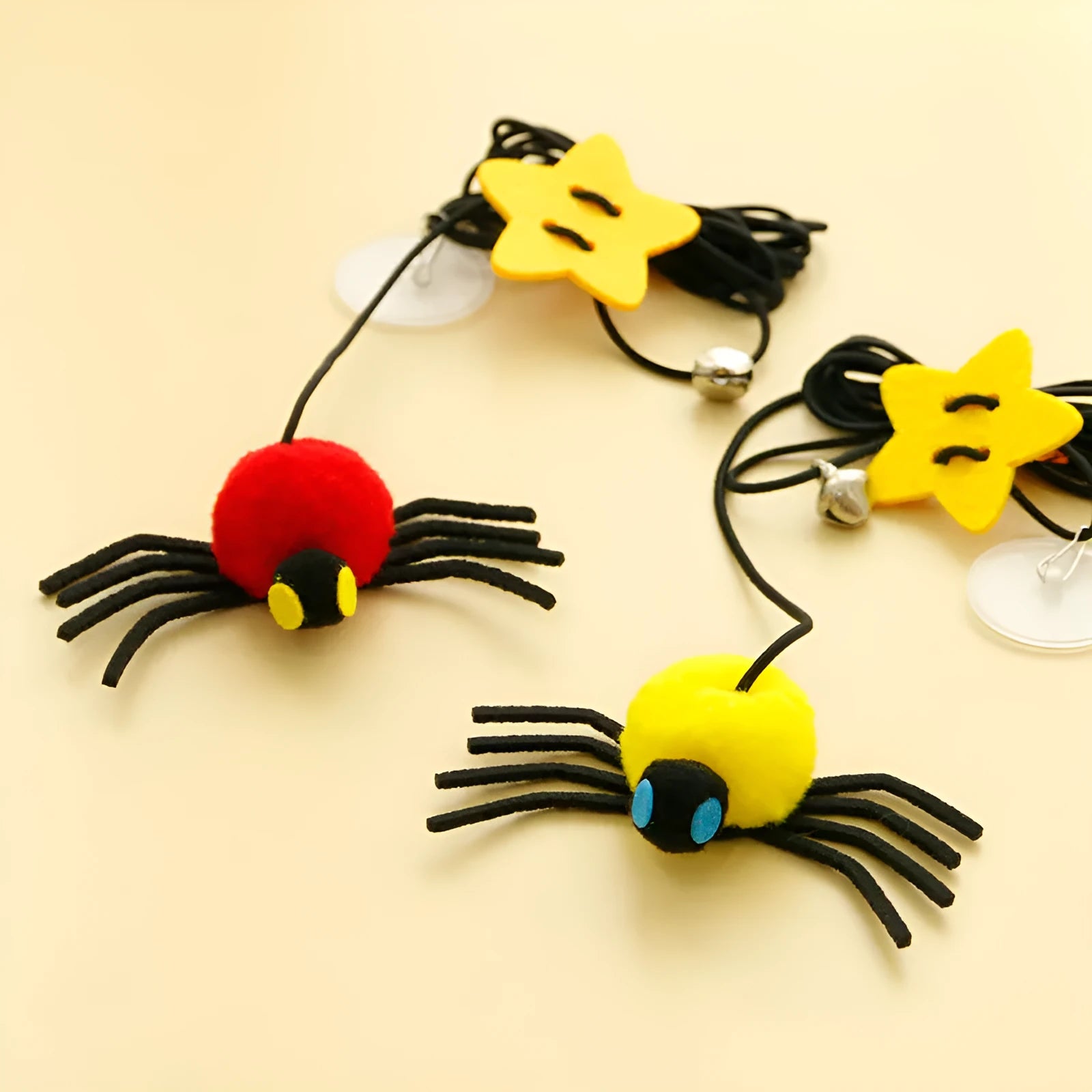 Hanging door cat toy with elastic rope and feather stick in red or yellow colour options