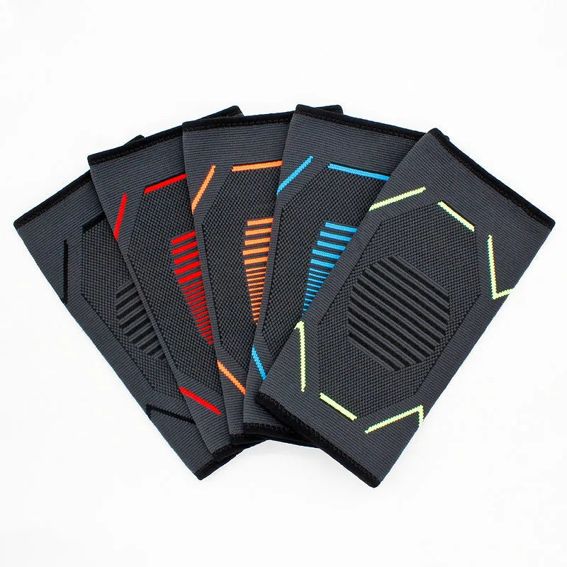 Grey knit elbow pad with coloured stripes for sports and fitness protection, shown on arm