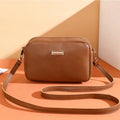 Solid colour PU ladies' shoulder bag in urban simplicity style with three-dimensional pocket.