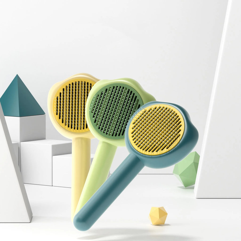 Self-cleaning pet grooming comb with needle teeth and colourful handle for cat coat maintenance